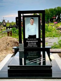 Пам'ятник із сірого граніту для двох поховань львів